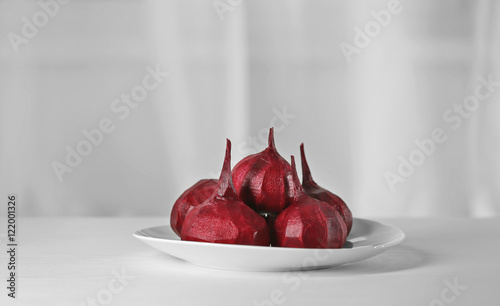 Tasty peeled beets on white plate
