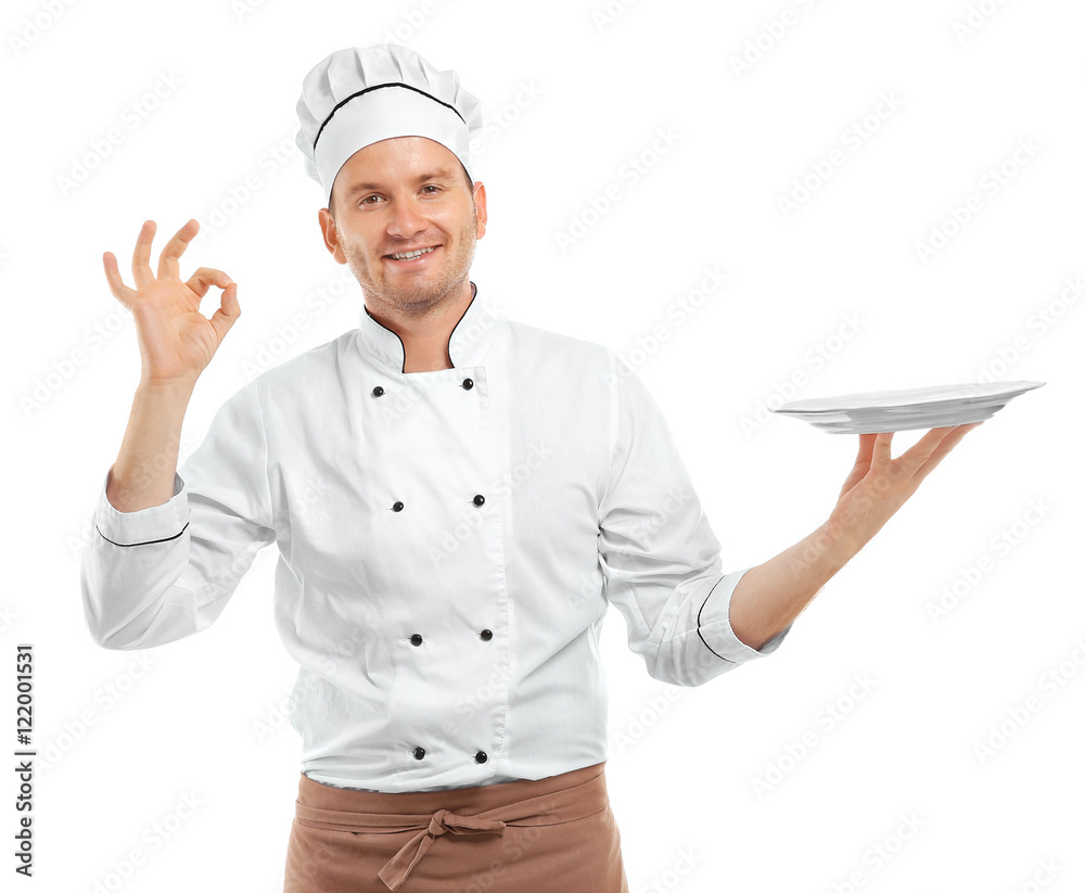 Young chef cook with empty plate isolated on white Young chef cook with empty plate isolated on white