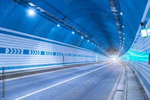 Abstract speed motion in urban highway road tunnel, blurred moti