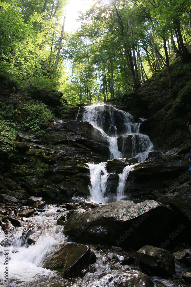Naklejka premium Waterfall in the mountains of Western Ukraine