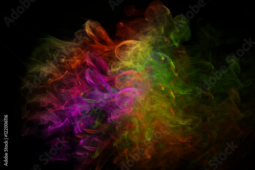 Launched colorful powder, on black background.Soft focus