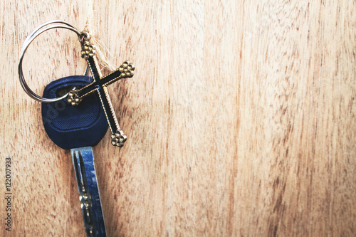 cross and key on wooden background