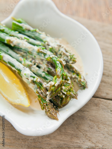 green asparagus in lemon sauce photo