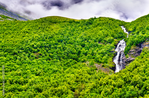 Waterfall in the Geiranger valley near Dalsnibba mountain photo