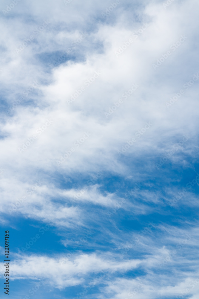 White clouds flying against blue sky. White clouds flying against blue sky.