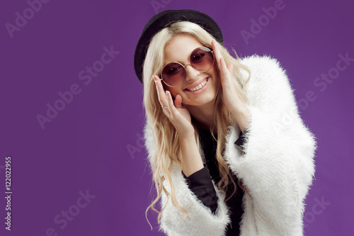 Young beautiful blonde woman in fashionable hat. Emotions are a huge surprise © Ulia Koltyrina