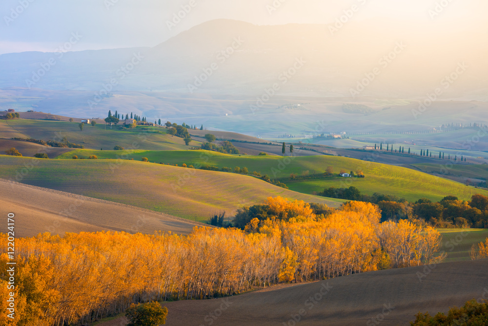 Autumn hills agriculture landscape in harvest time