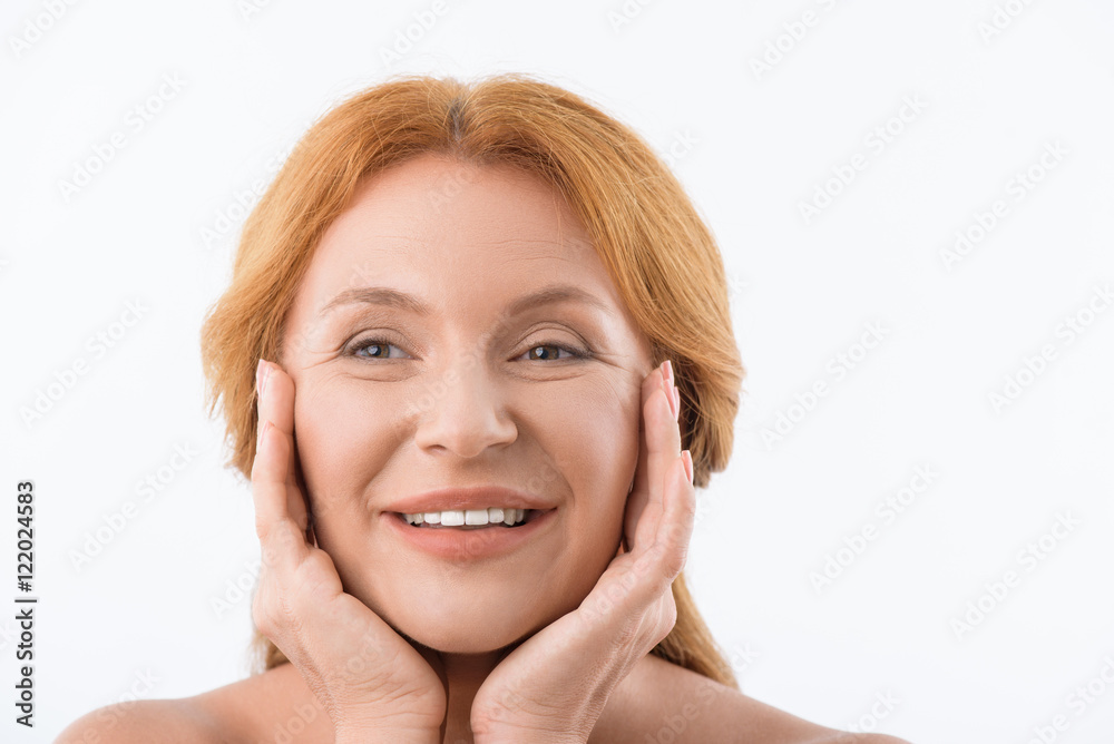 Pretty lady is caring of her skin Pretty lady is caring of her skin