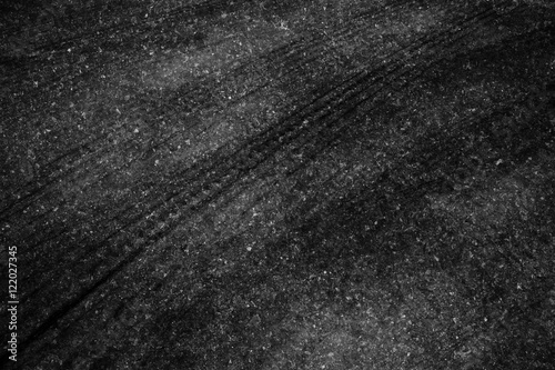 Asphalt background texture with some fine grain in it background