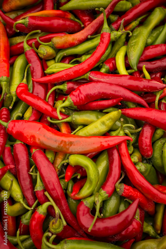 Red and green Chili peppers background.