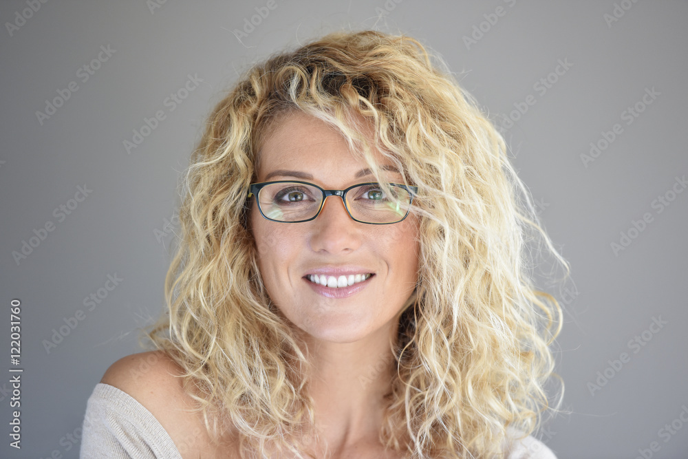 Portrait of attractive blond woman with eyeglasses, isolated Portrait of attractive blond woman with eyeglasses, isolated