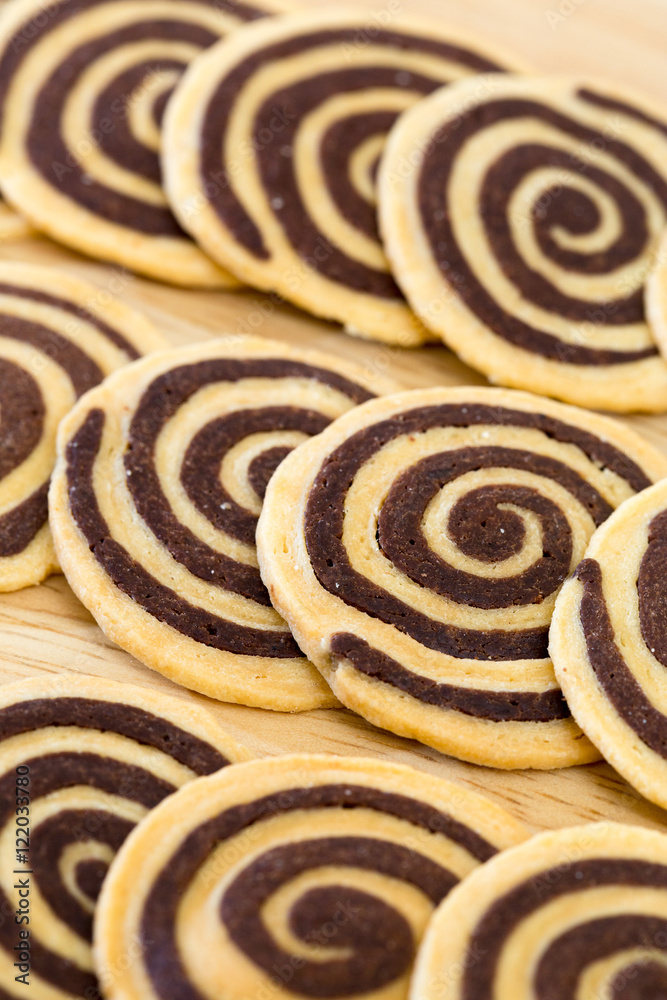 Pile of pinwheel chocolate cookie - Close up shot Pile of pinwheel chocolate cookie - Close up shot