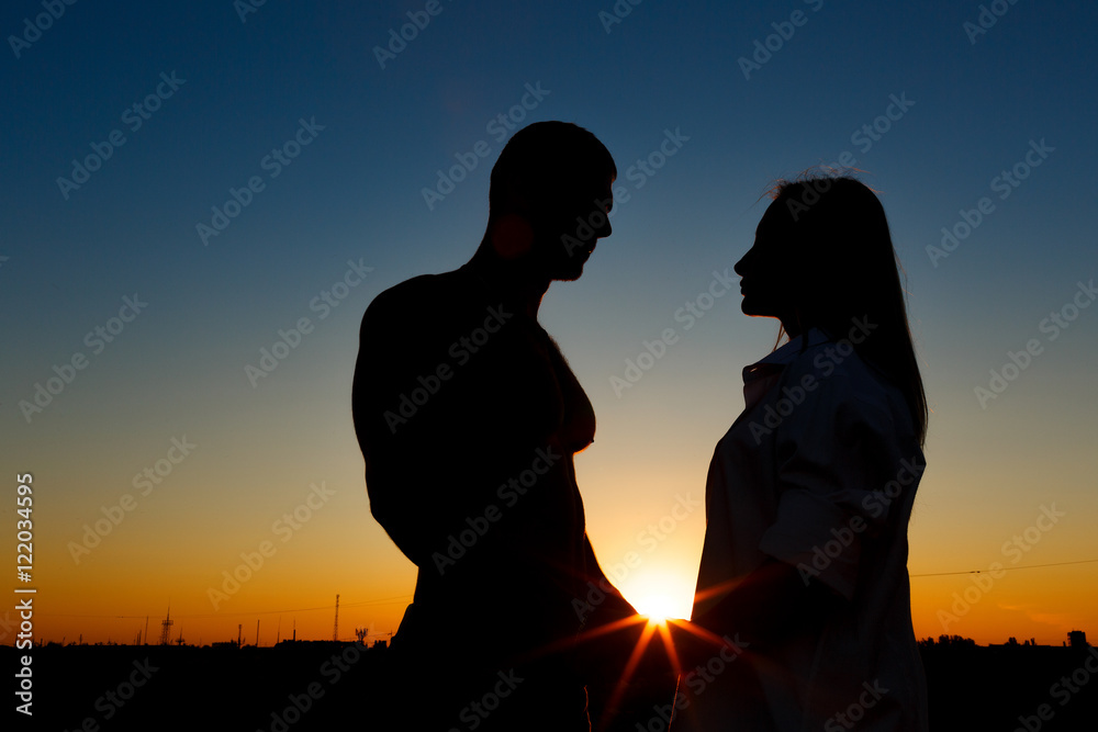Silhouettes of men and women
