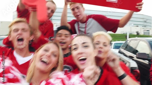 Extensive video series with football fans at a tailgate party, having fun.  Set in a parking lot outside an arena...Shot in 4k on Lumix FZ1000.