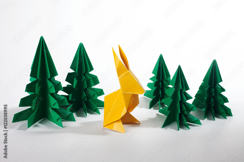Origami rabbit isolated on neutral background