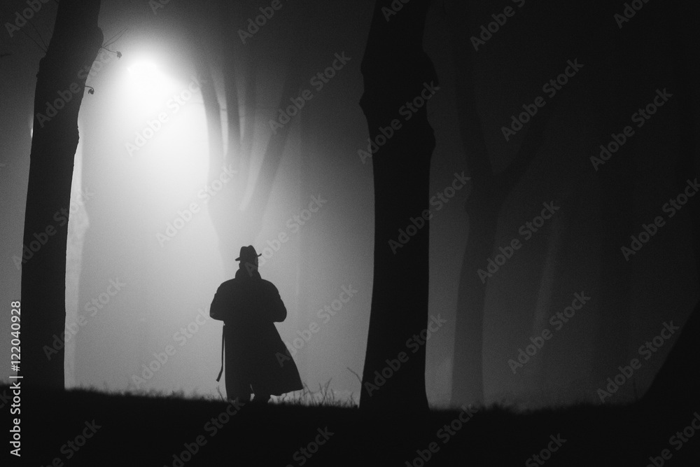 Detective on his way through the pitch dark Detective on his way through the pitch dark
