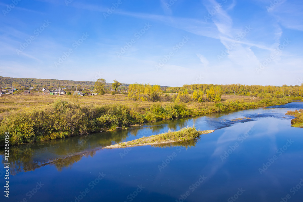 Rural autumn landscape with river
