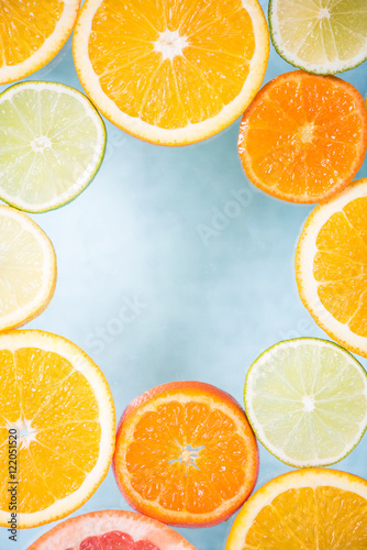 Citrus fruits frame background