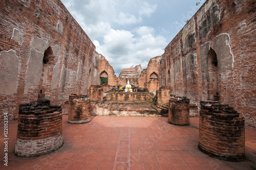 Ancient broken pagoda at Wat Kudi Dao old. The ancient temple in Ayutthaya, Thailand photo