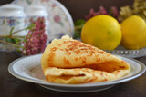 Vanilla crepe. Tasty sweet breakfast. Still life. End brunch on a sweet note with pretty and tasty paper-thin crepes.