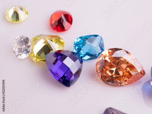 Jewel or gems on White shine color, Collection of many different natural gemstones amethyst, lapis lazuli, rose quartz, citrine, ruby, amazonite, moonstone, labradorite, chalcedony, blue topaz