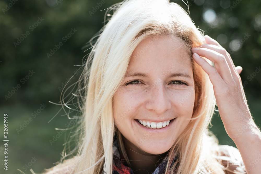 Naklejka premium Outdoor portrait of a blonde woman 
