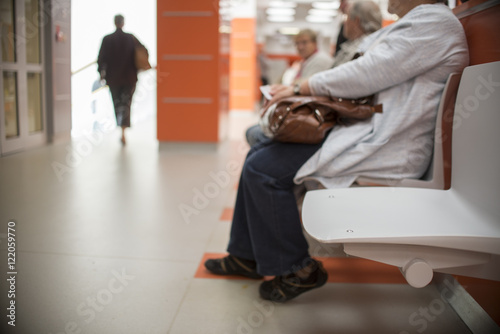 close up on Chairs for patient and visitor in hospital, defocused people