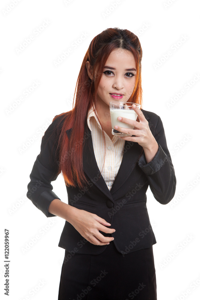 Healthy Asian woman drinking a glass of milk. Healthy Asian woman drinking a glass of milk.