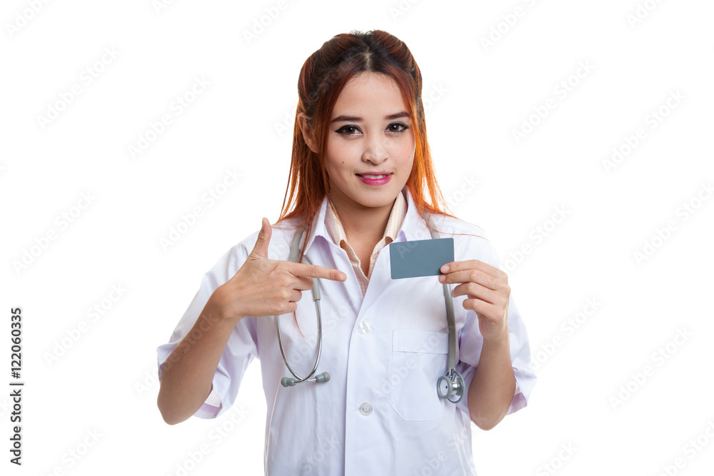 Asian young female doctor point to blank card. Asian young female doctor point to blank card.