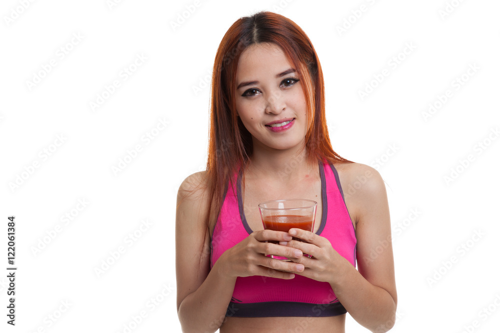 Beautiful healthy Asian girl with tomato juice. Beautiful healthy Asian girl with tomato juice.
