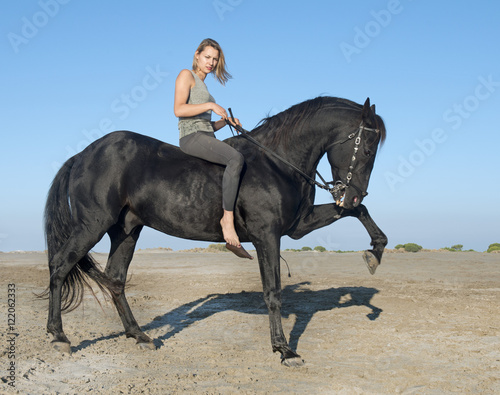 horse woman on the beach