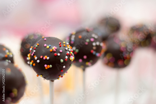 Delicious chocolate cake pops with sprinkles - sweet food