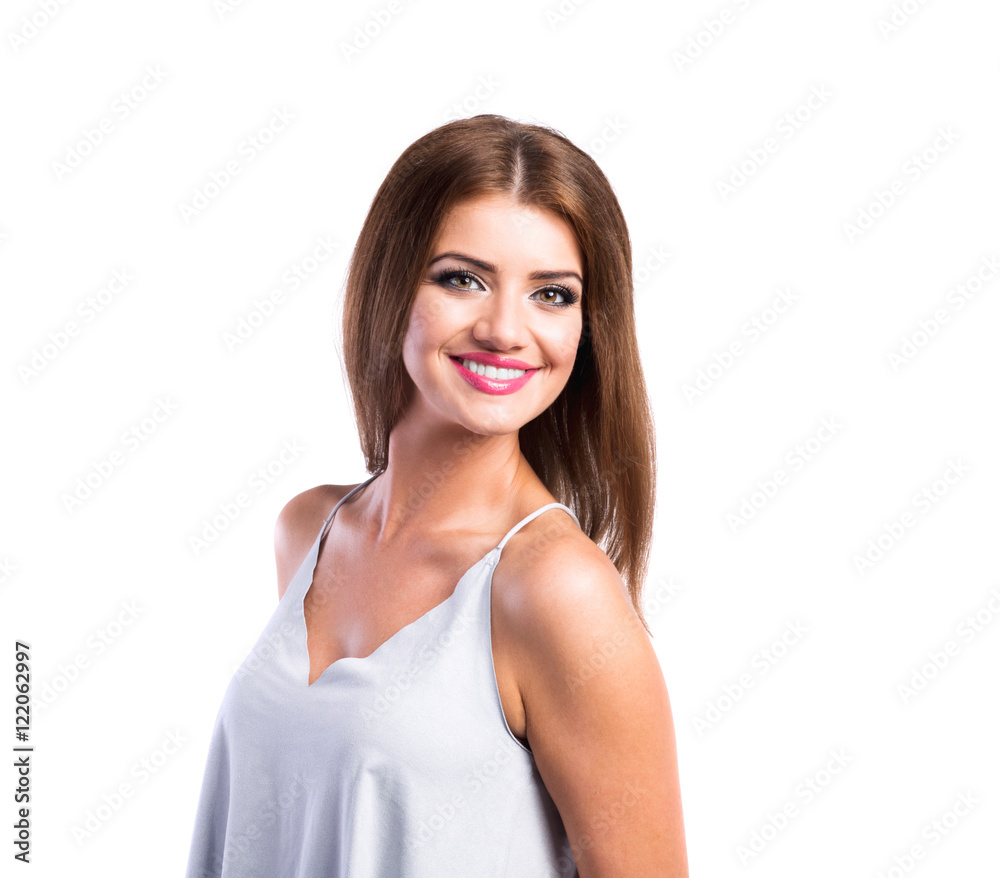 Young beautiful woman in white top, studio shot, isolated Young beautiful woman in white top, studio shot, isolated
