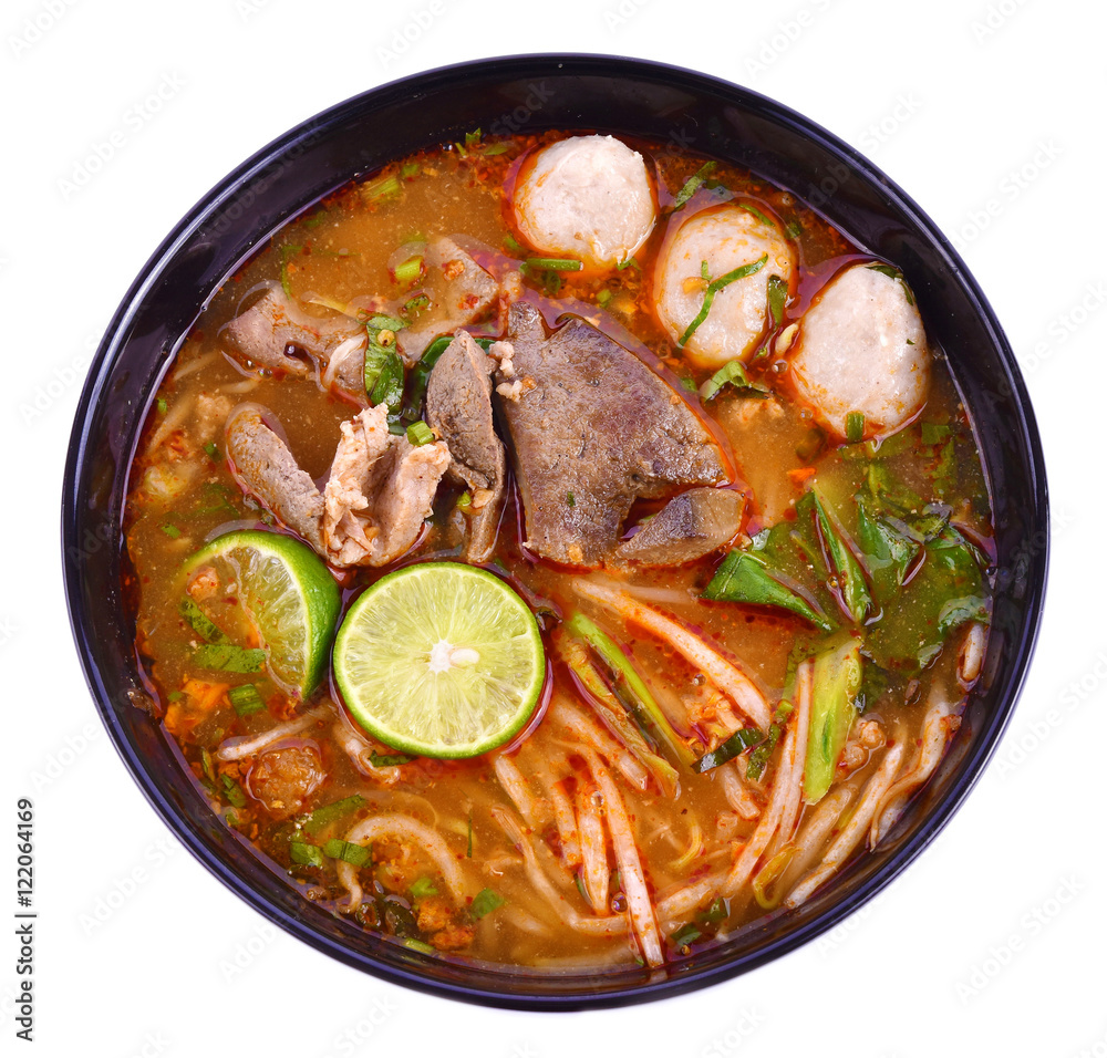 Noodles in Thai spicy tom yum soup with pork Noodles in Thai spicy tom yum soup with pork