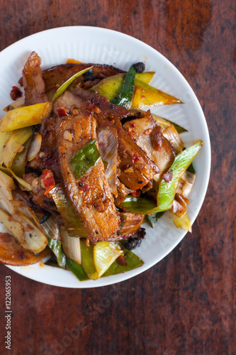 Twice cooked pork - traditional Chinese dish from Sichuan region . 