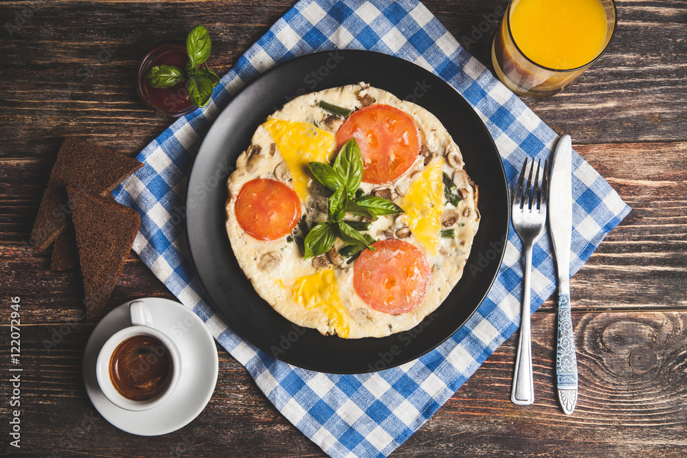 Omelet with tomatoes, parsley and feta cheese Omelet with tomatoes, parsley and feta cheese