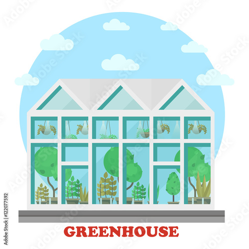 Glass greenhouse with plant in pot and tree