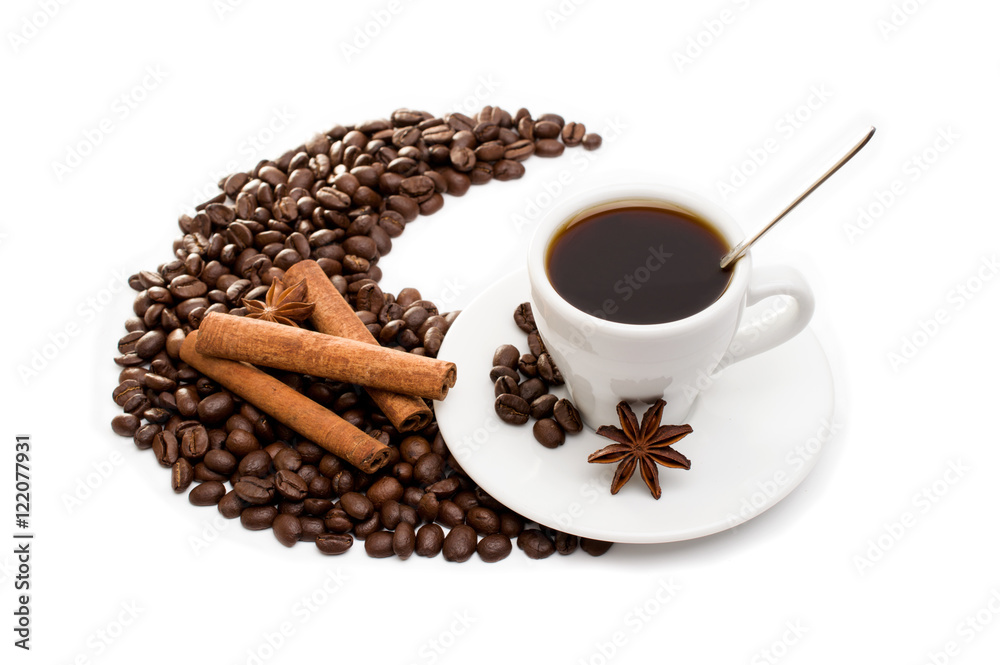 Naklejka premium cup of coffee with cinnamon sticks, anise and chocolate