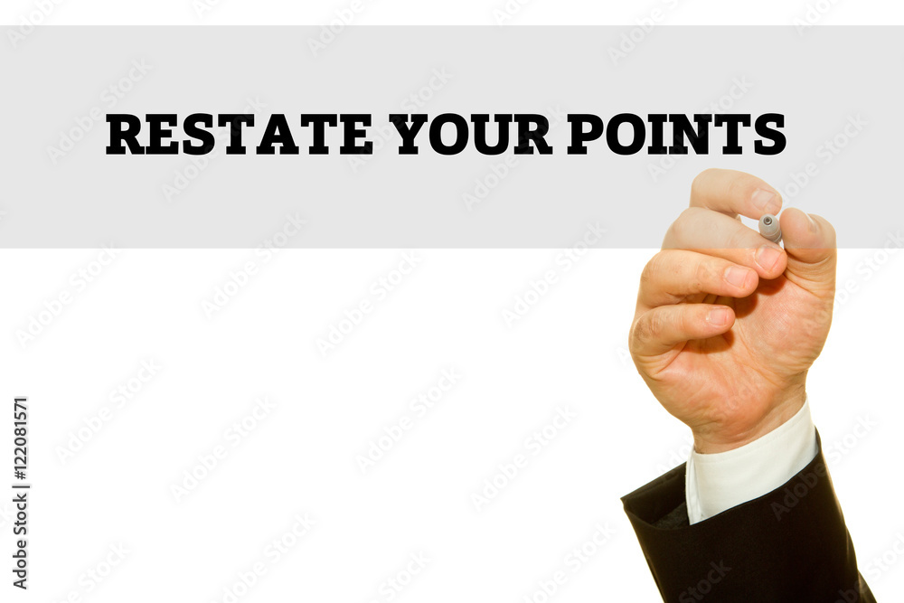 Businessman hand writing RESTATE YOUR POINT on a transparent wipe board. Businessman hand writing RESTATE YOUR POINT on a transparent wipe board.