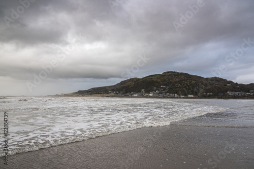 Sea view with a mountain in the background photo