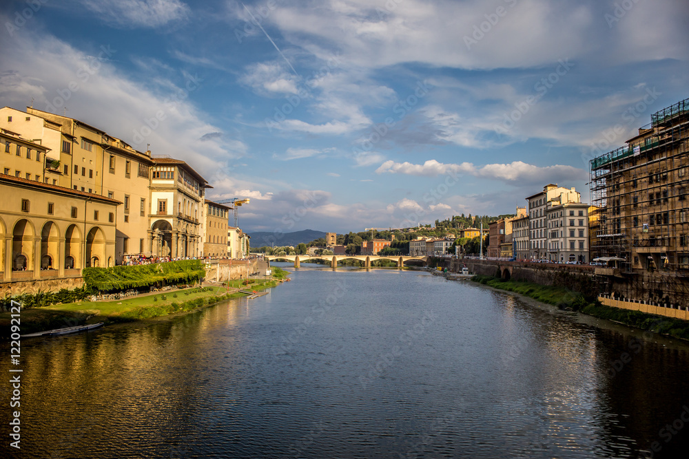 Arno river and one of its bridge in Florence, Italy