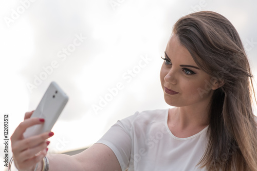 girl taking selfie