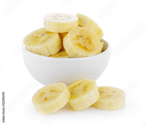 slice banana in bowl on white background