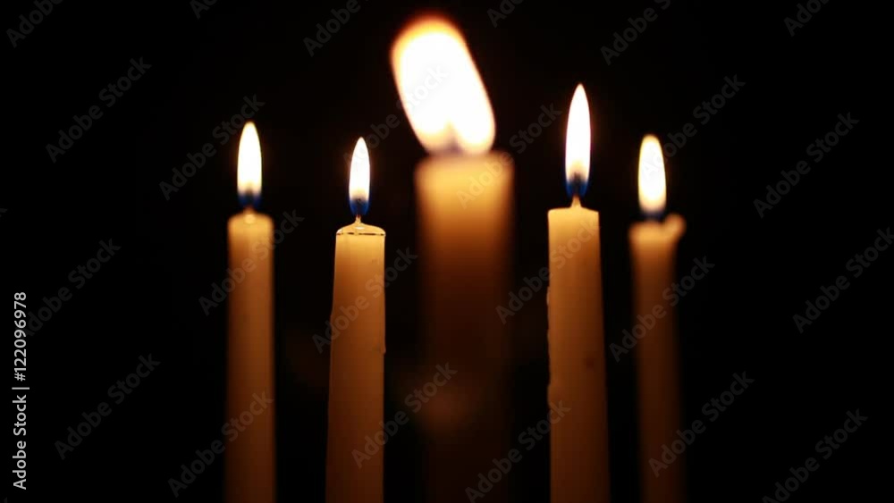A shot of five candles with focus on the outer candles. HD 1080. A shot of five candles with focus on the outer candles. HD 1080.