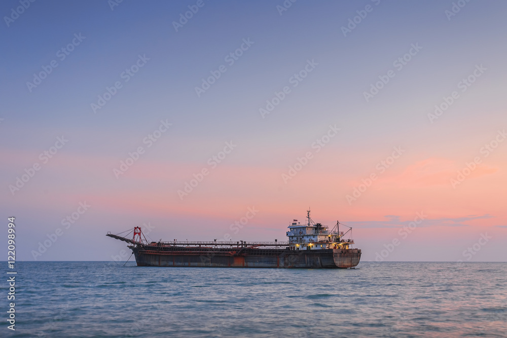 Cargo ship with Sunset.