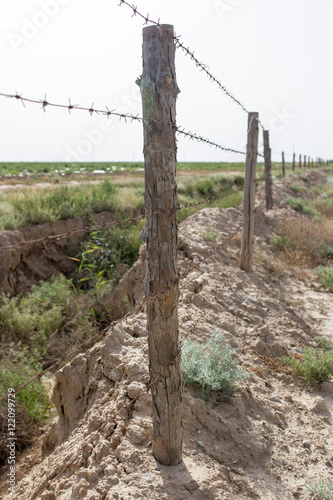 barbed wire fence in the nature