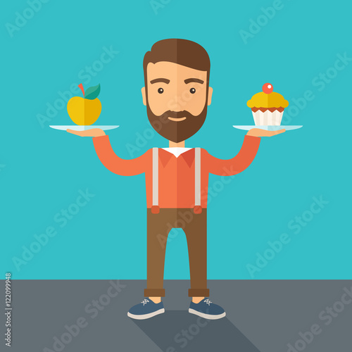 Man carries with his two hands cupcake and apple. photo