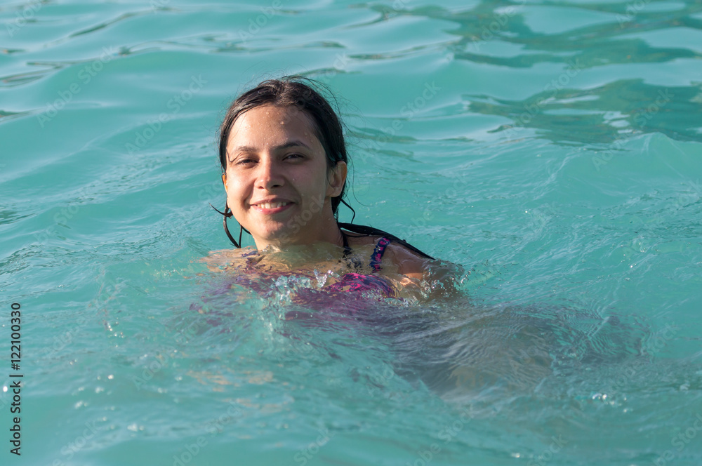 girl in a bathing suit in the water park