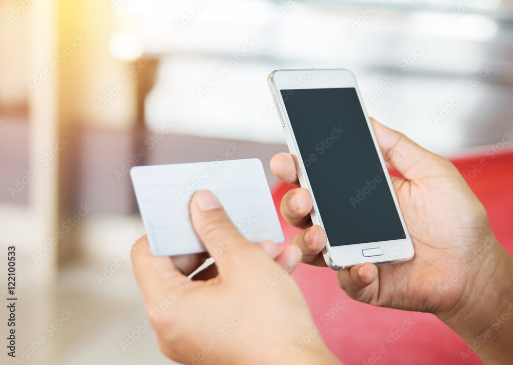 Smart phone online shopping in woman hand.