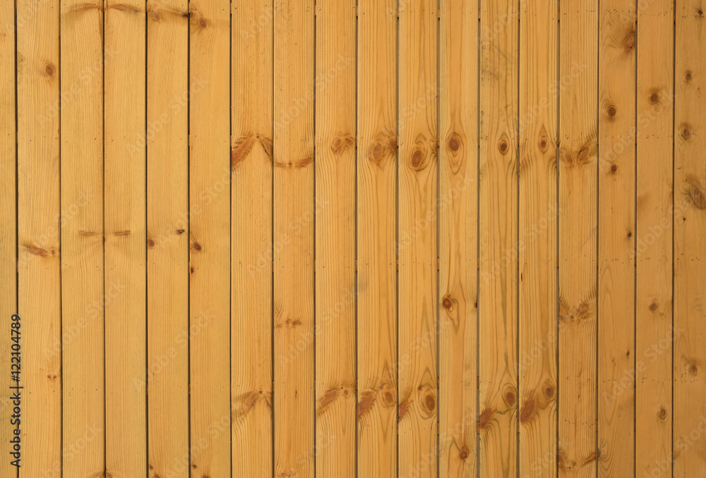 Fototapeta premium Plank, Wooden walls in the living room of Forest House. Vertical wooden wall background texture